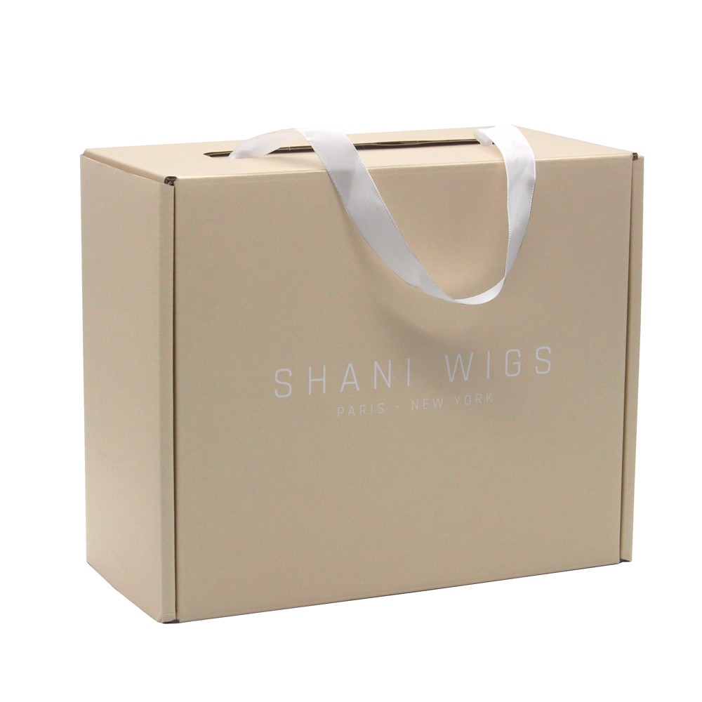 Corrugated paper box with ribbon handle