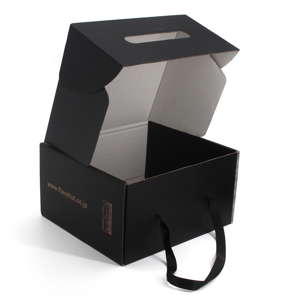 Black shipping box with ribbon