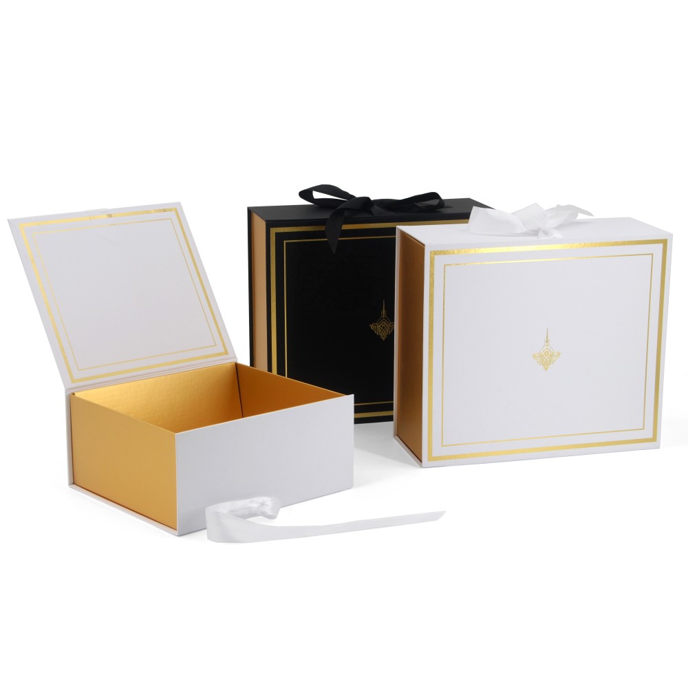 Gift boxes with ribbon closure