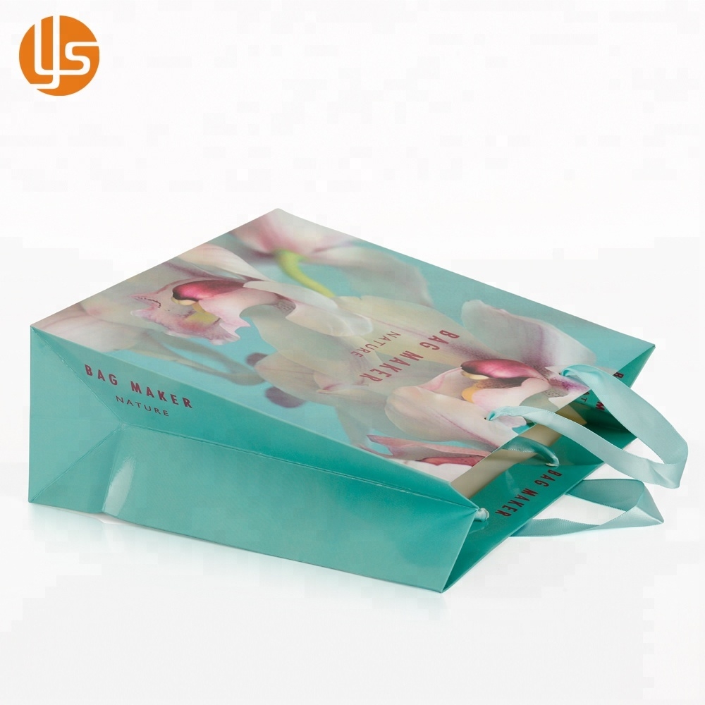 Luz azul personalizado primavera floral hibisco flores design sacos de transporte de papel alça de fita sacos de compras para casamento