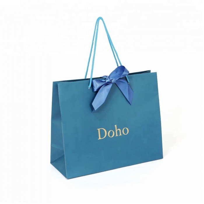 Bolsa de regalo de papel de embalaje de boutique cosmética hecha a mano personalizada de moda de alta calidad al por mayor