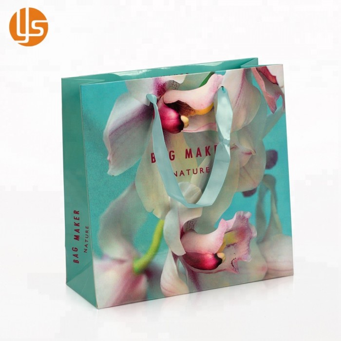 Hellblaue kundenspezifische Frühlings-Blumen-Hibiskus-Blumen-Entwurfs-Papiertragetaschen-Band-Griff-Einkaufseinkaufstüten für Hochzeit